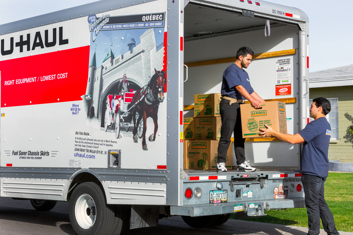 Dubai Moving team loading a U-Haul truck